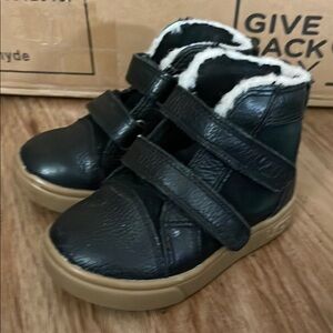 UGG Black and Tan Boots with Velcro Straps